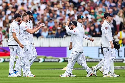 Gus Atkinson celebrates the wicket of Shamar Joseph